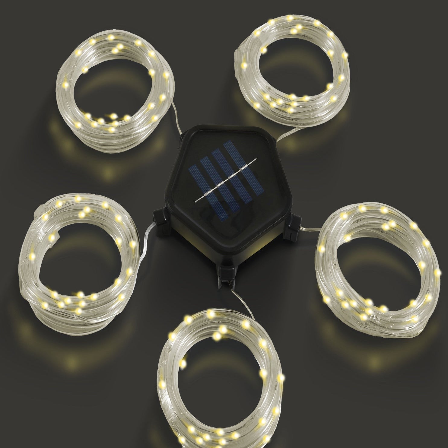 Solar-powered LED string lights on a dark background