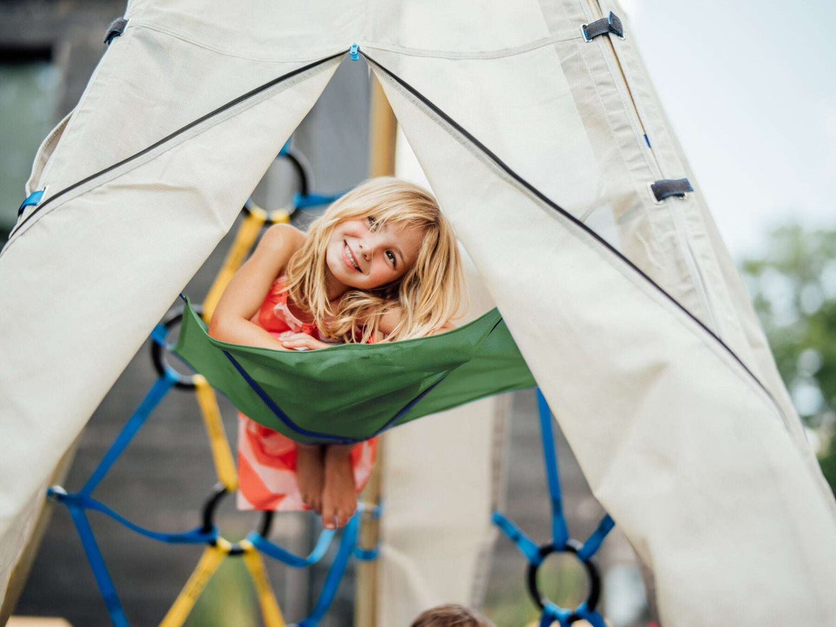 Child climbing on a Bijou Build play structure