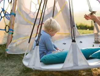 Young child using Bijou Build outdoors